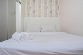 Minimalist and Warm 2BR at Bassura City Apartment By Travelio